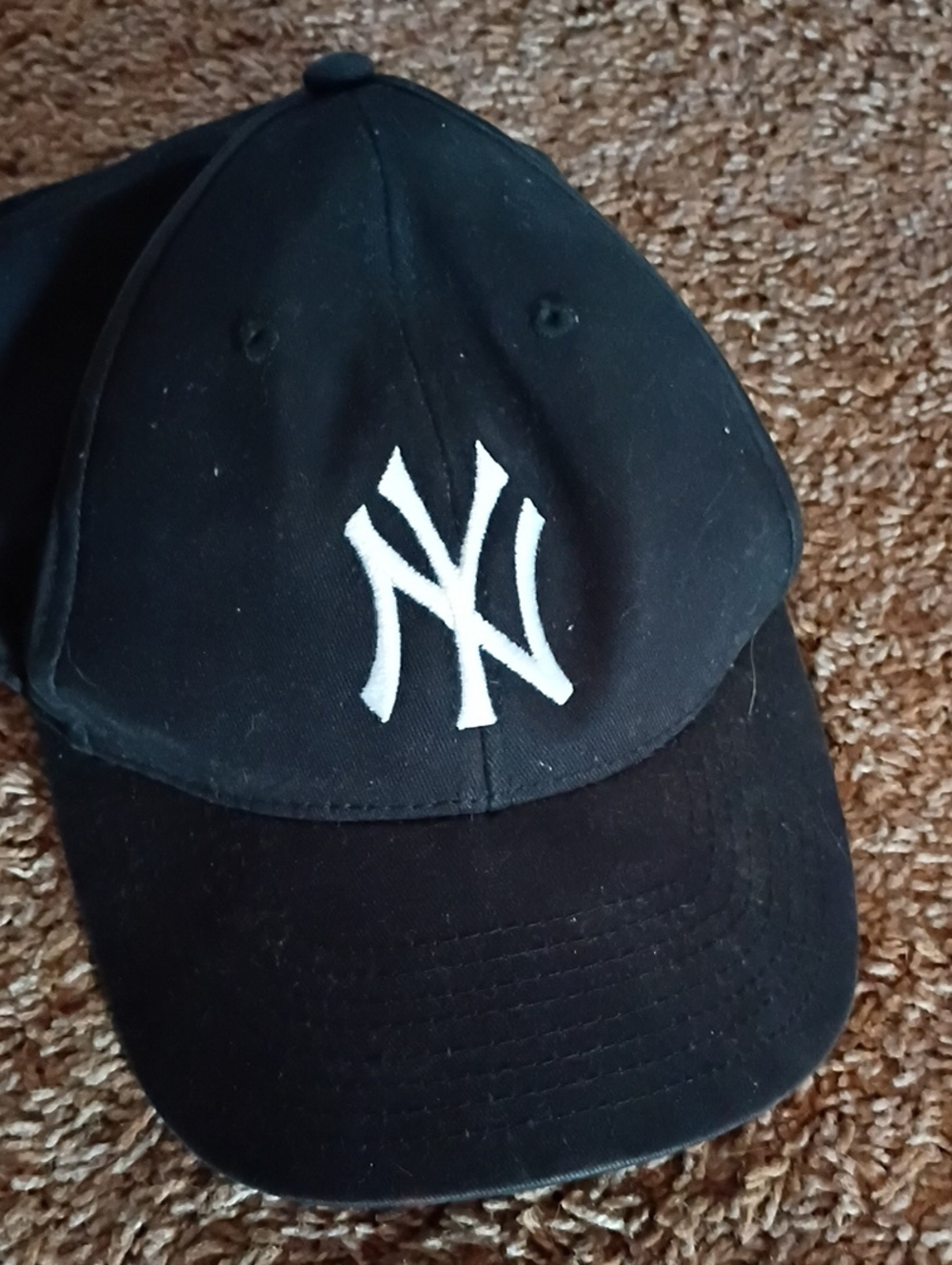 Black Baseball Cap with White Interlocking NY Logo